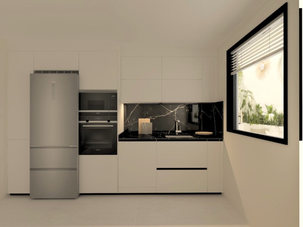 Cocina Santos rectangular, pequeña pero muy bien distribuida, dividida en dos frentes, donde por un lado tenemos la zona de agua junto con el lavavajillas, horno y microondas y justo al lado un frigorífico a la vista.