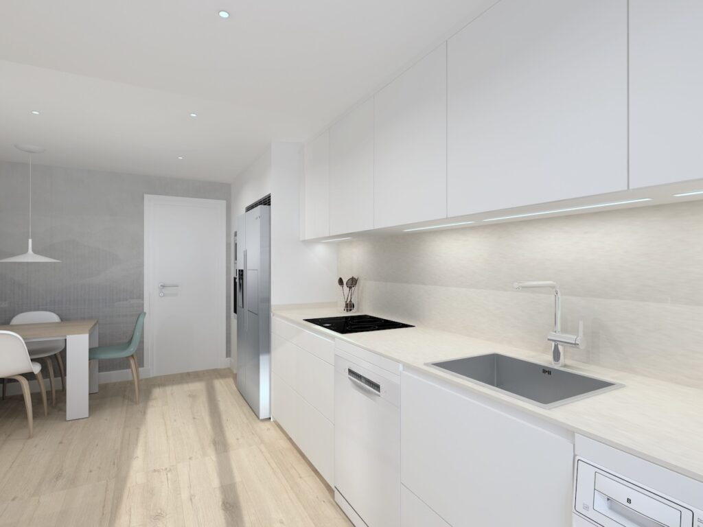 Esta cocina es un ejemplo perfecto de cómo el minimalismo puede dar lugar a un espacio cálido, práctico y visualmente armonioso. Con un diseño lineal y despejado, el mobiliario en blanco mate crea una atmósfera luminosa y amplia que invita al orden y la calma.