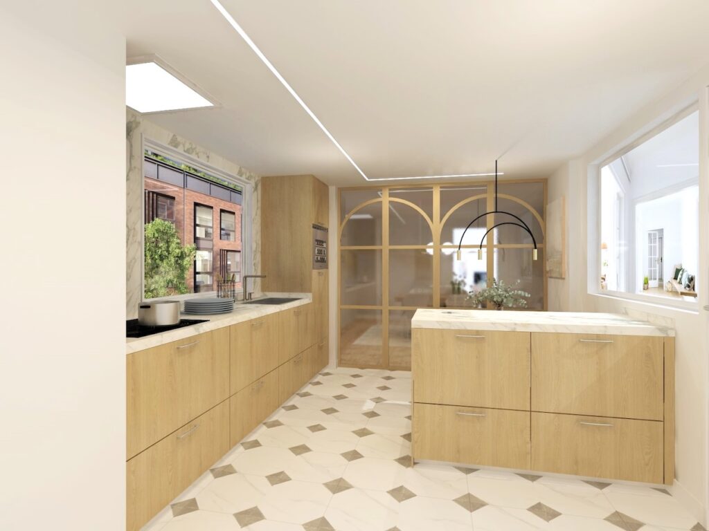 Esta cocina con comedor integrado se articula como un espacio elegante y lleno de luz